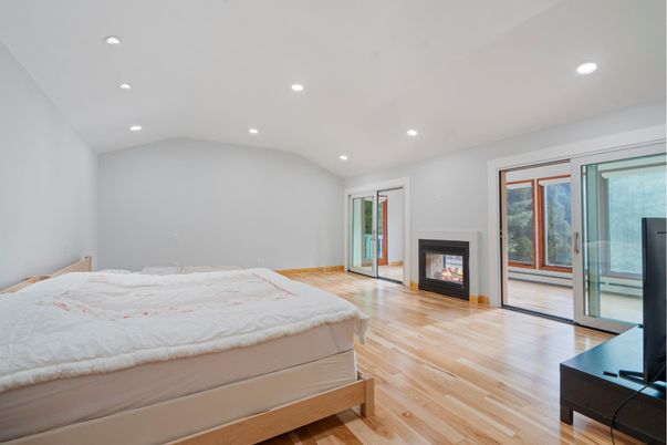 Bedroom, Fireplace, Interior, Recessed Lighting, Wood Texture Flooring