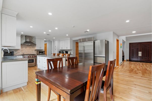 Dining room, Interior, Kitchen, Recessed Lighting, Stainless Steel Appliances, Wood Texture Flooring