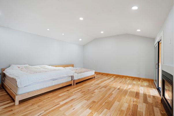Bedroom, Fireplace, Interior, Recessed Lighting, Wood Texture Flooring
