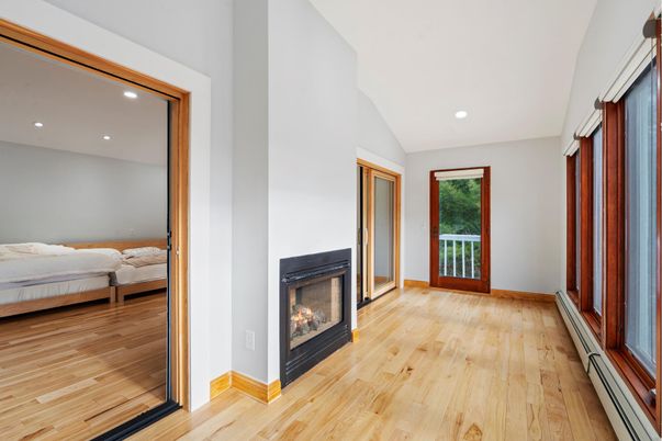 Bedroom, Fireplace, Interior, Recessed Lighting, Wood Texture Flooring
