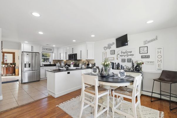 Dining room, Interior, Kitchen, Recessed Lighting, Stainless Steel Appliances, Wood Texture Flooring