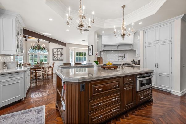 Chandelier, Dining room, Interior, Kitchen, Recessed Lighting, Stainless Steel Appliances, Wood Texture Flooring