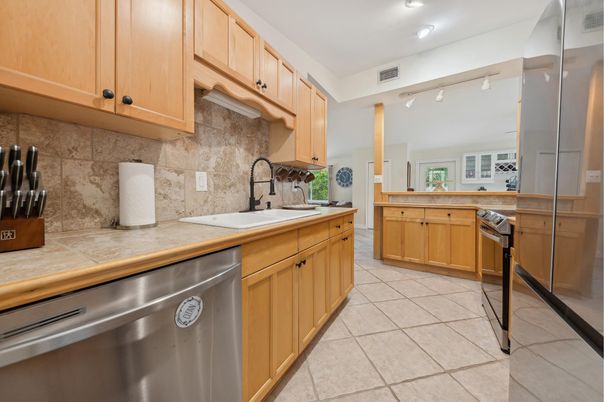 Interior, Kitchen, Recessed Lighting, Stainless Steel Appliances, Tile Countertops