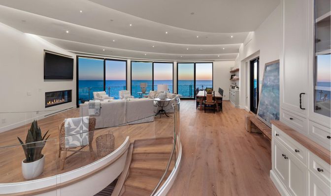 Dining room, Fireplace, Interior, Living room, Recessed Lighting, Water, Wood Texture Flooring