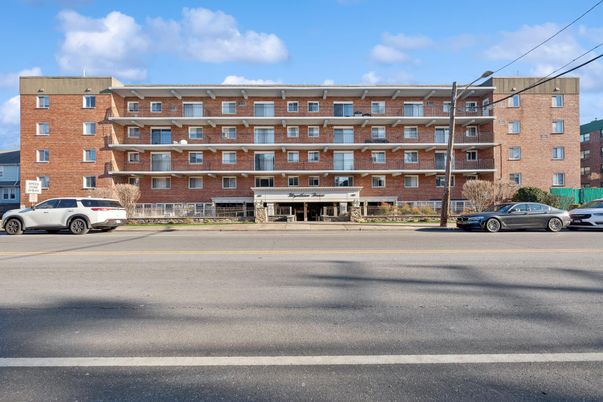 Exterior, Facade, Brick Facade, Condo Building