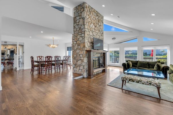 Dining room, Fireplace, Interior, Living room, Pendant Lights, Recessed Lighting, Stone Walls, Wood Texture Flooring