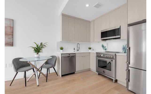 Dining room, Interior, Kitchen, Recessed Lighting, Stainless Steel Appliances, Wood Texture Flooring