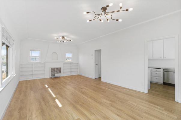 Empty room, Fireplace, Interior, Kitchen, Pendant Lights, Wood Texture Flooring