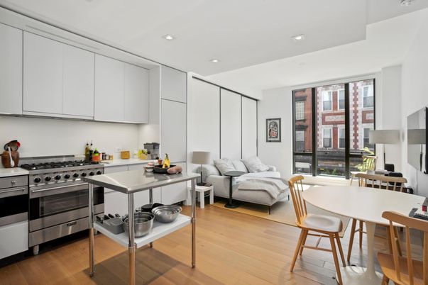 Dining room, Interior, Kitchen, Living room, Recessed Lighting, Stainless Steel Appliances, Wood Texture Flooring