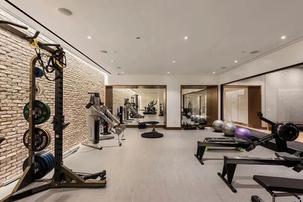 Fitness Equipment, Gym, Interior, Recessed Lighting, Stone Walls, Wood Texture Flooring