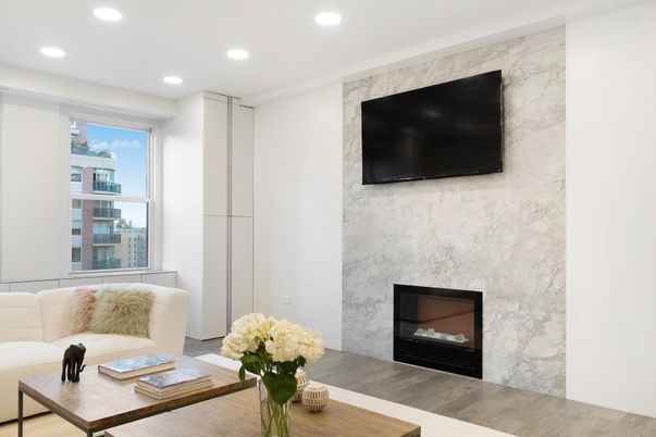 Fireplace, Interior, Living room, Marble Walls, Recessed Lighting, Wood Texture Flooring