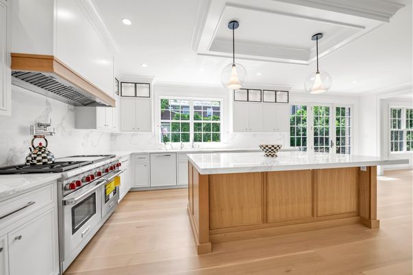 Interior, Kitchen, Marble Walls, Pendant Lights, Recessed Lighting, Stainless Steel Appliances, Wood Texture Flooring