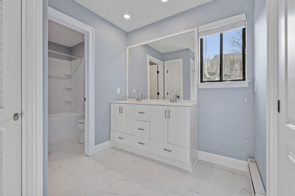 Bathroom, Dual Sink Vanities, Glass Shower, Interior, Marble, Recessed Lighting