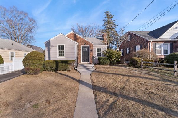 Exterior, Facade, Brick Facade, Cape Cod