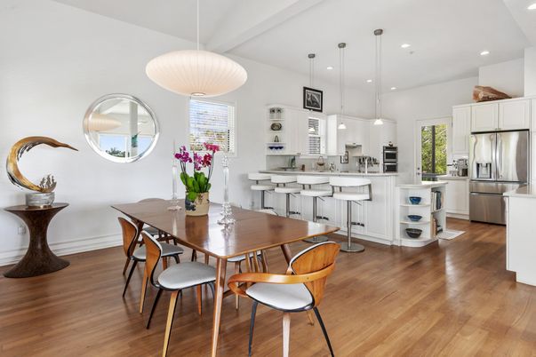 Dining room, Interior, Kitchen, Pendant Lights, Recessed Lighting, Stainless Steel Appliances, Wood Texture Flooring
