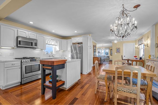 Chandelier, Dining room, Interior, Kitchen, Recessed Lighting, Stainless Steel Appliances, Wood Texture Flooring