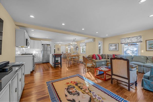 Chandelier, Dining room, Interior, Kitchen, Living room, Recessed Lighting, Stainless Steel Appliances, Wood Texture Flooring