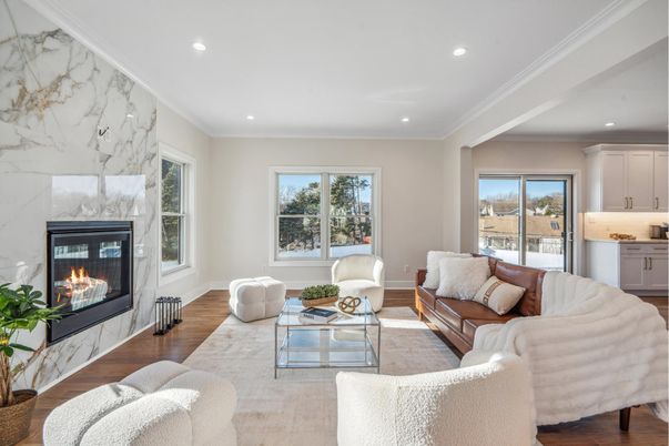 Fireplace, Interior, Living room, Marble Walls, Recessed Lighting, Wood Texture Flooring