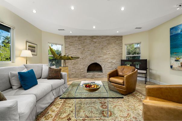 Fireplace, Interior, Living room, Recessed Lighting, Stone Walls, Wood Texture Flooring