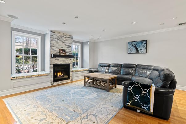 Fireplace, Interior, Living room, Recessed Lighting, Stone Walls, Wood Texture Flooring