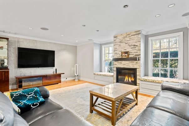 Fireplace, Interior, Living room, Recessed Lighting, Stone Walls, Wood Texture Flooring