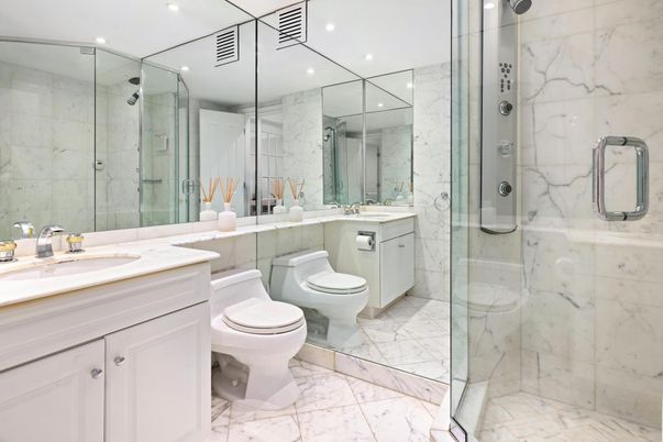 Bathroom, Dual Sink Vanities, Glass Shower, Interior, Marble, Marble Walls, Recessed Lighting