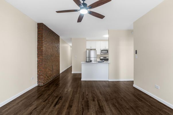 Interior, Kitchen, Recessed Lighting, Stainless Steel Appliances, Stone Walls, Wood Texture Flooring