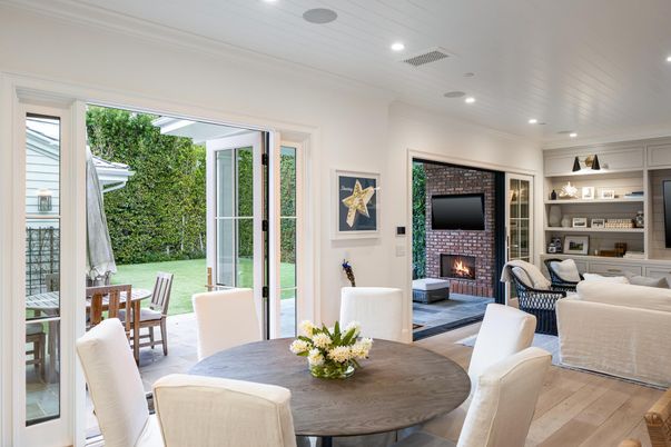 Dining room, Fireplace, Interior, Living room, Recessed Lighting, Wood Texture Flooring