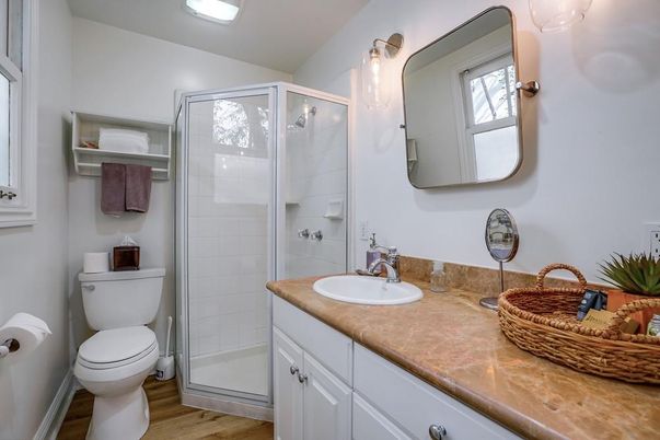 Bathroom, Dual Sink Vanities, Glass Shower, Interior, Wood Texture Flooring