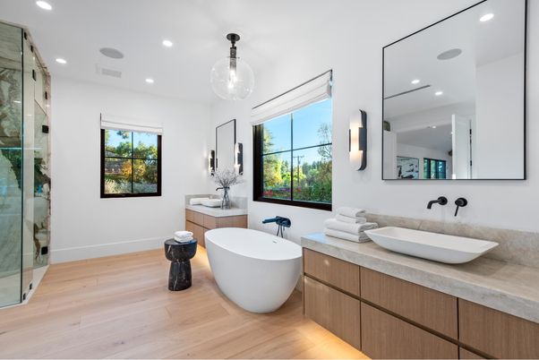 Bathroom, Dual Sink Vanities, Free Standing Baths, Glass Shower, Interior, Pendant Lights, Recessed Lighting, Wood Texture Flooring
