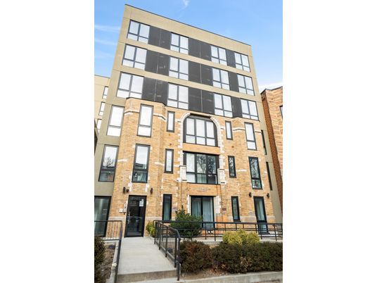 Exterior, Facade, Brick Facade, Condo Building