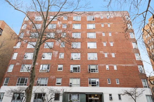 Exterior, Facade, Brick Facade, Condo Building