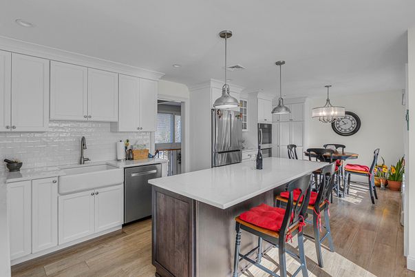 Dining room, Interior, Kitchen, Pendant Lights, Recessed Lighting, Stainless Steel Appliances, Wood Texture Flooring