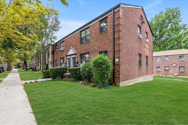 Exterior, Facade, Brick Facade, Condo Building