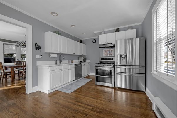 Dining room, Interior, Kitchen, Recessed Lighting, Stainless Steel Appliances, Wood Texture Flooring