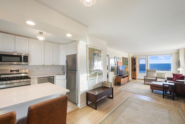 Chandelier, Dining room, Interior, Kitchen, Recessed Lighting, Stainless Steel Appliances, Water, Wood Texture Flooring