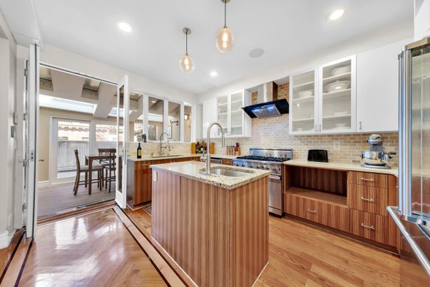 Dining room, Interior, Kitchen, Pendant Lights, Recessed Lighting, Stainless Steel Appliances, Stone Walls, Wood Texture Flooring