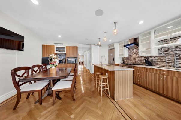Dining room, Interior, Kitchen, Pendant Lights, Recessed Lighting, Stainless Steel Appliances, Wood Texture Flooring
