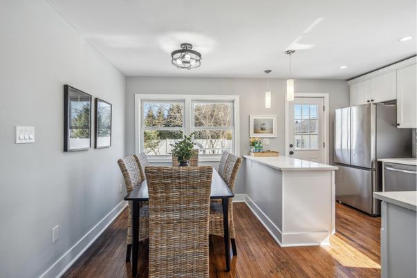 Dining room, Interior, Kitchen, Pendant Lights, Recessed Lighting, Stainless Steel Appliances, Wood Texture Flooring