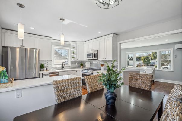 Dining room, Interior, Kitchen, Pendant Lights, Recessed Lighting, Stainless Steel Appliances, Wood Texture Flooring