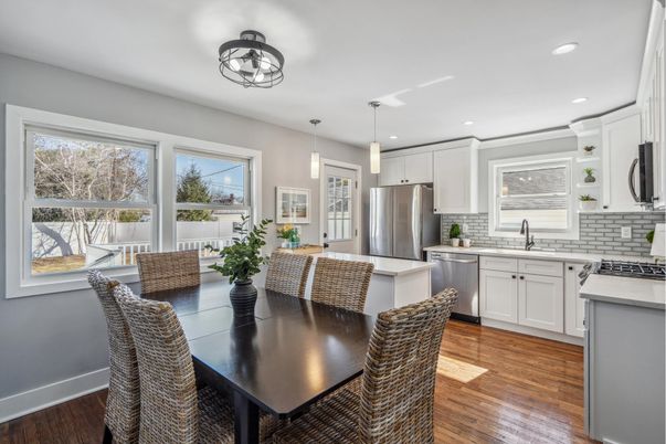 Dining room, Interior, Kitchen, Pendant Lights, Recessed Lighting, Stainless Steel Appliances, Wood Texture Flooring