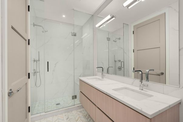 Bathroom, Dual Sink Vanities, Glass Shower, Interior, Marble, Marble Walls, Recessed Lighting