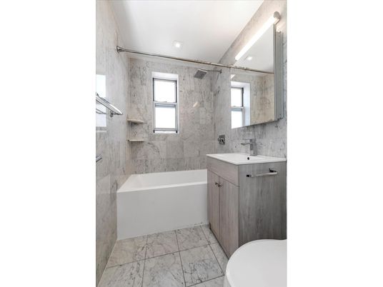 Bathroom, Free Standing Baths, Glass Shower, Interior, Marble, Marble Walls, Recessed Lighting