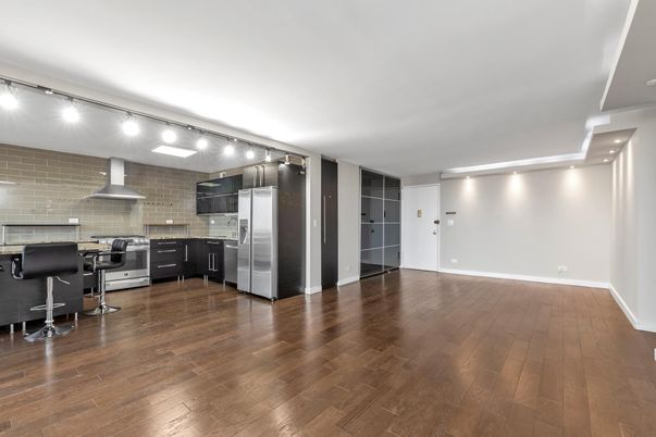 Interior, Kitchen, Recessed Lighting, Stainless Steel Appliances, Stone Walls, Wood Texture Flooring