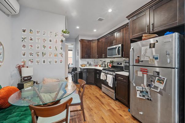 Dining room, Interior, Kitchen, Pendant Lights, Recessed Lighting, Stainless Steel Appliances, Wood Texture Flooring