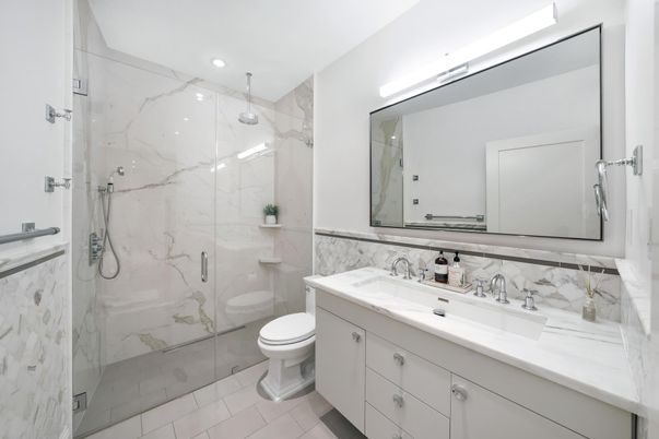 Bathroom, Dual Sink Vanities, Glass Shower, Interior, Marble Walls, Recessed Lighting