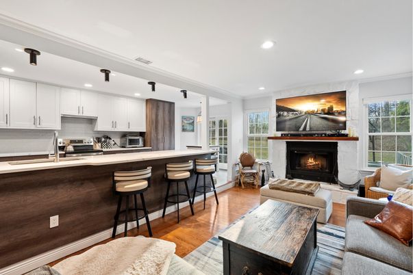Dining room, Fireplace, Interior, Kitchen, Living room, Recessed Lighting, Stainless Steel Appliances, Wood Texture Flooring