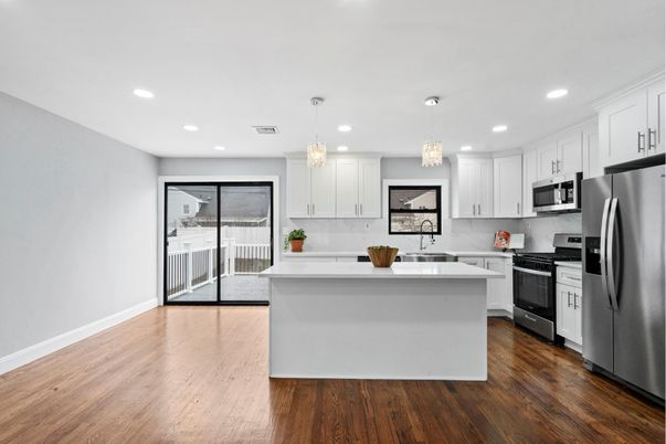 Chandelier, Interior, Kitchen, Pendant Lights, Recessed Lighting, Stainless Steel Appliances, Wood Texture Flooring