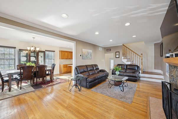 Chandelier, Dining room, Fireplace, Interior, Living room, Recessed Lighting, Wood Texture Flooring