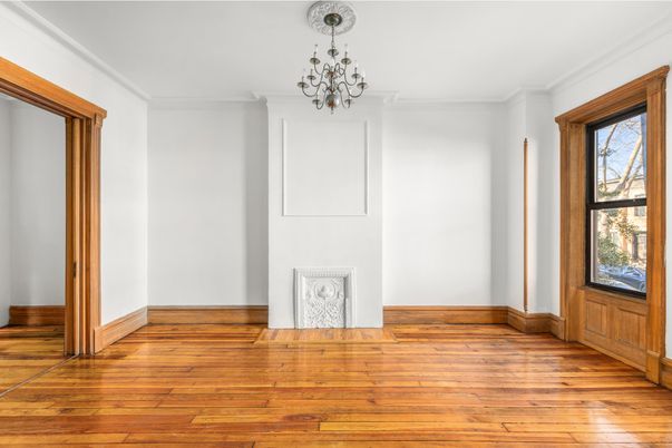 Chandelier, Empty room, Fireplace, Interior, Wood Texture Flooring